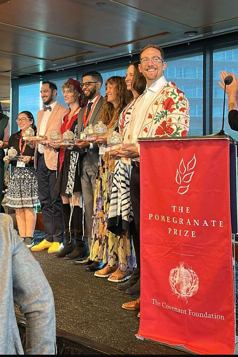 Rabbi Dave accept Pomegranite Award